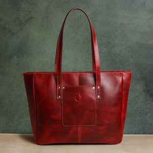 Dotch handmade leather tote worn crossbody by female model